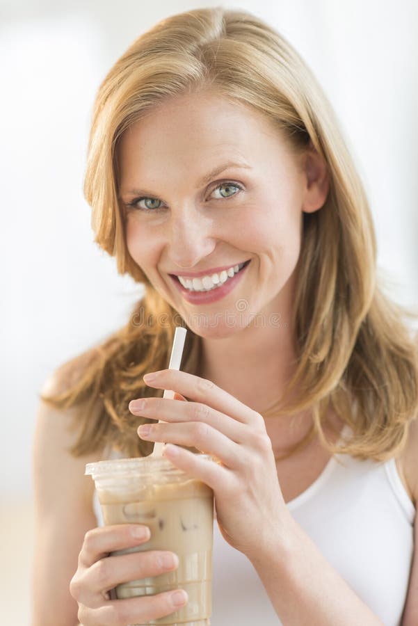 Woman Holding Chocolate Milkshake Glass royalty free stock photography Woman Holding Chocolate Milkshake Glass royalty free stock photography