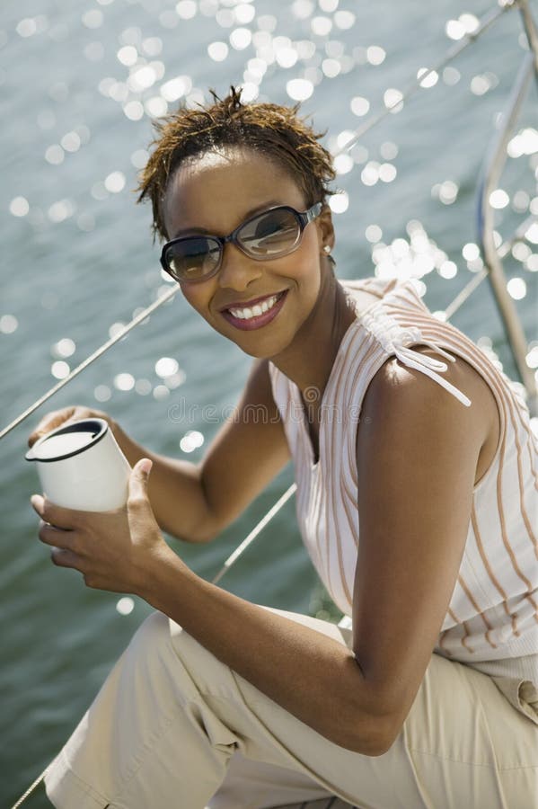 Woman Holding Coffee Cup stock image. Image of relaxing 29645831