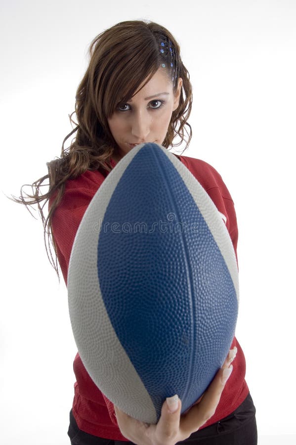 Woman holding football