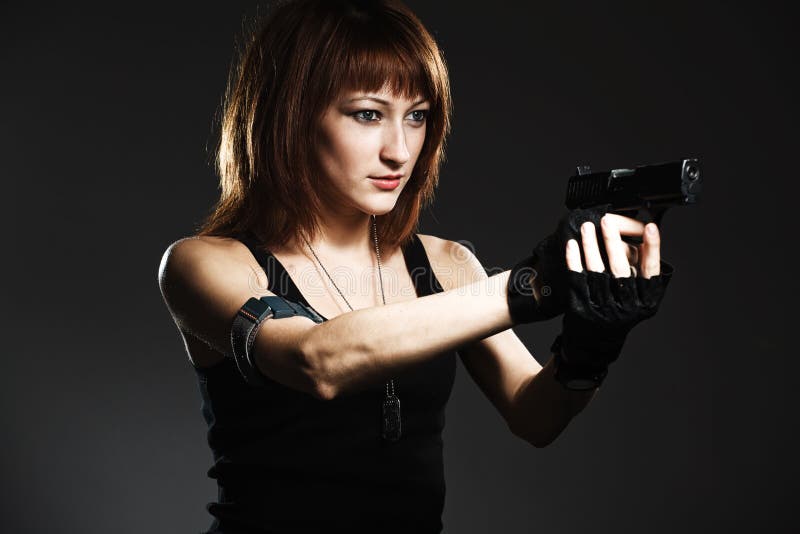 Woman holding gun stock image. Image of handgun, matrix - 23196279