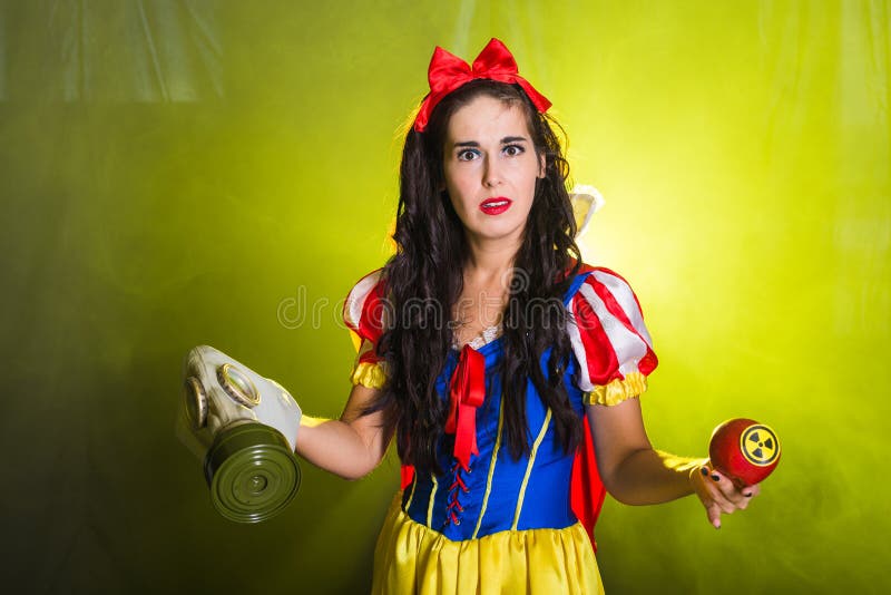 Woman holding hazardous radioactive apple. Nuclear and radiation measurement concept. Woman holding hazardous radioactive apple. Nuclear and radiation royalty free stock photography Woman holding hazardous radioactive apple. Nuclear and radiation measurement concept. Woman holding hazardous radioactive apple. Nuclear and radiation royalty free stock photography