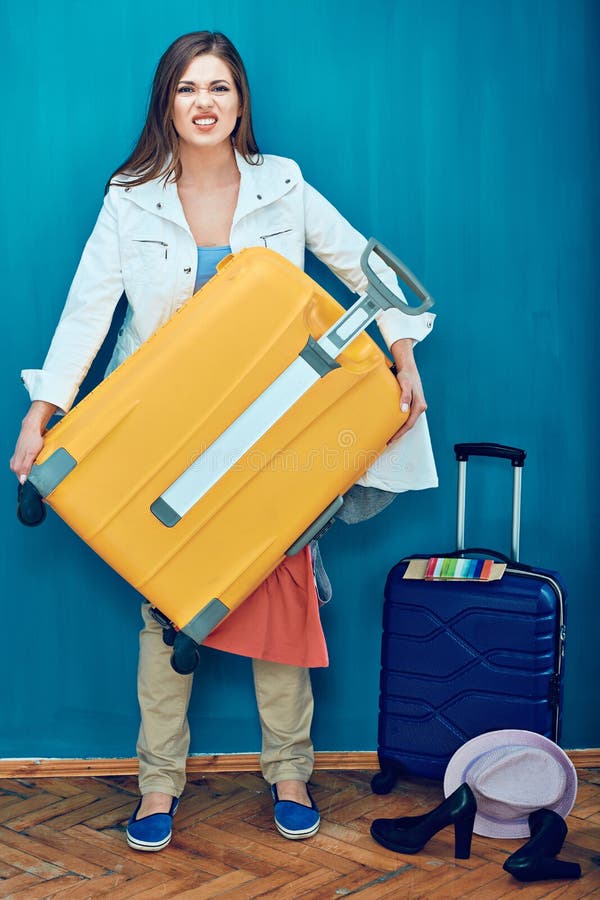 Woman Holding Heavy Weight Suitcase with Clothes Stock Photo Image of