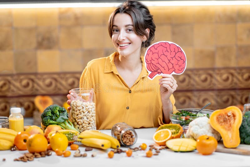 Human brain model and variety of healthy fresh food