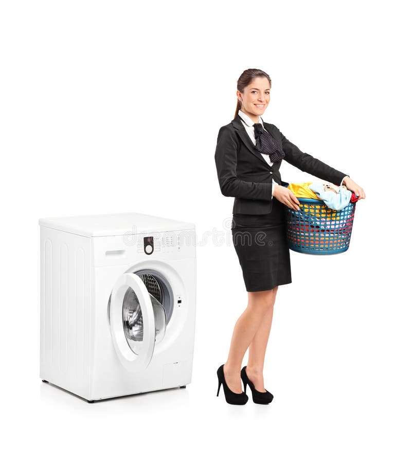 Woman Holding a Laundry Basket Next To a Machine Stock Image Image of laundry, launder 22303021