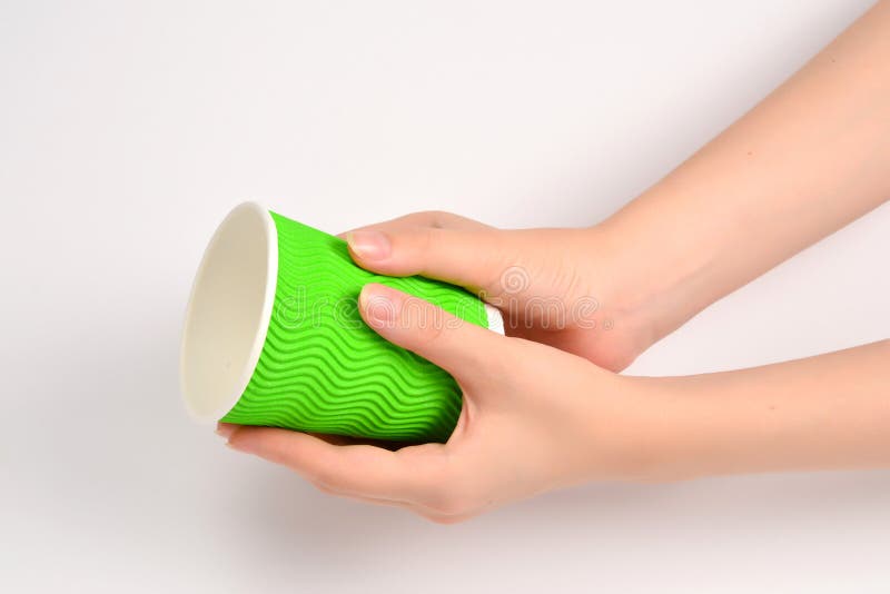 Woman and holding paper cup for vaious drinks isolated on white stock photography Woman and holding paper cup for vaious drinks isolated on white stock photography