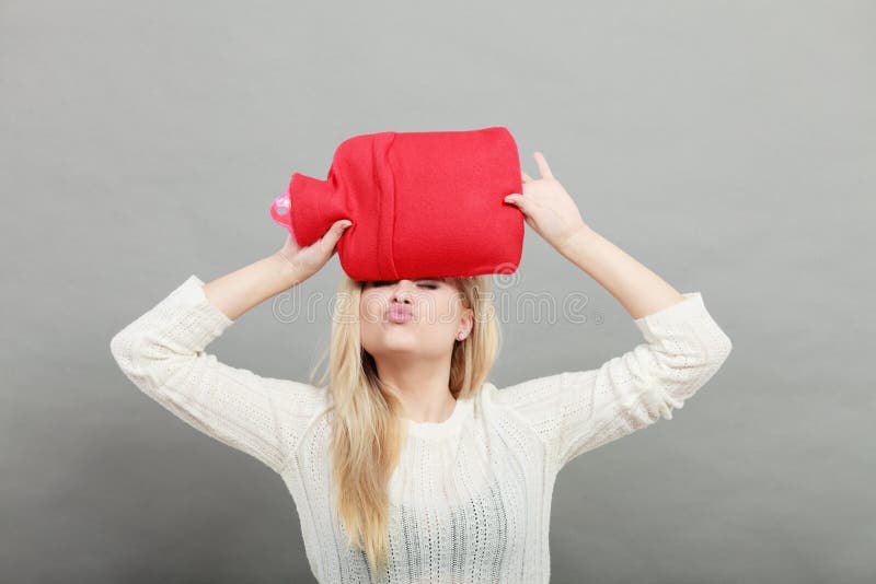 Woman Holding Red Hot Water Bottle on Head Stock Photo - Image of funny, bottle: 109842712 Woman Holding Red Hot Water Bottle on Head Stock Photo - Image of funny, bottle: 109842712