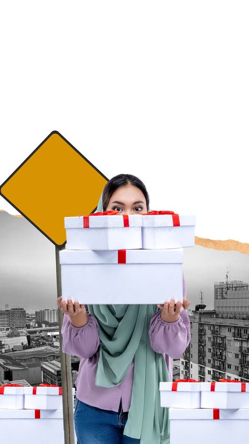 A woman is holding a stack of white boxes and a yellow sign royalty free stock photography