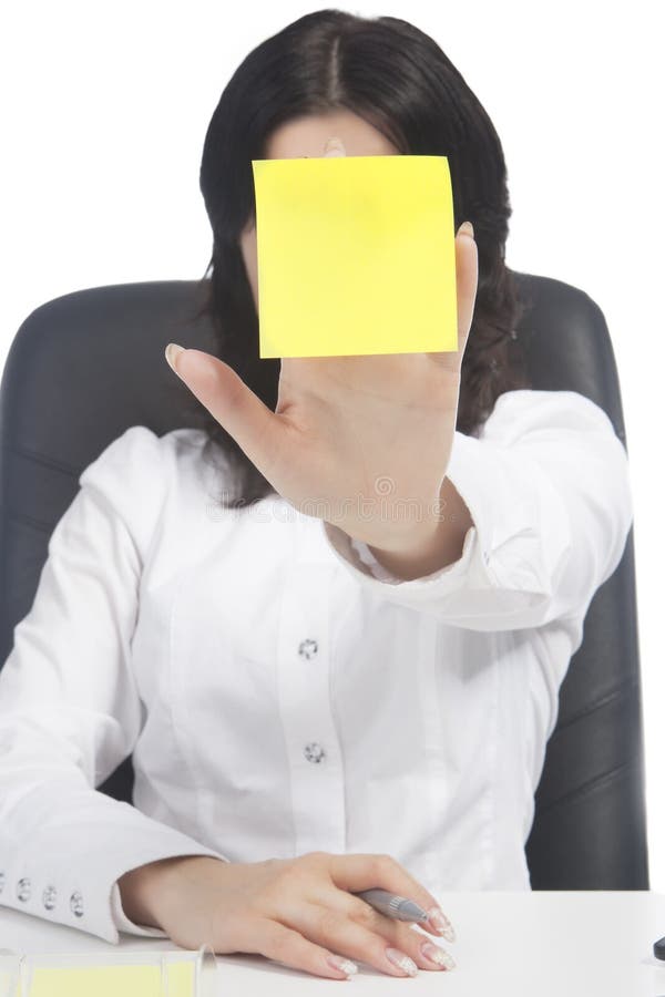 Woman holding sticker note in front of the face