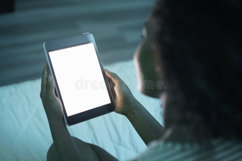 Woman Holding Tablet PC At Night Mockup stock images Woman Holding Tablet PC At Night Mockup stock images