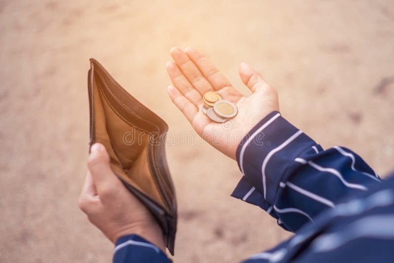 woman holds empty purse coins hand meaning money financial problem bankrupt jobless broke credit card payday 189763213