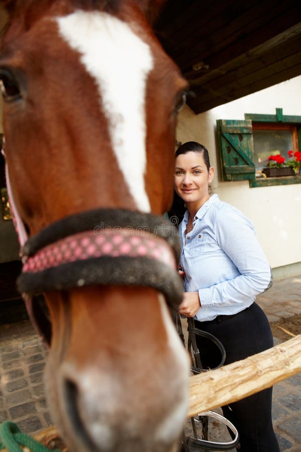 Woman and horse best friends stock photo Woman and horse best friends stock photo