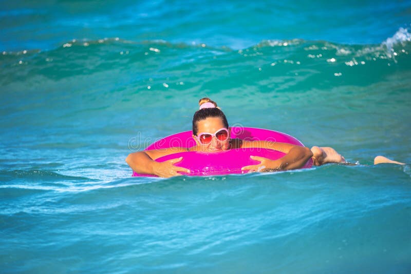 Woman with inner tube royalty free stock images