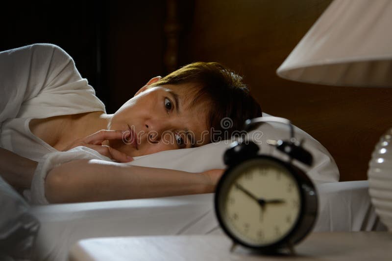 Woman with insomnia stock image