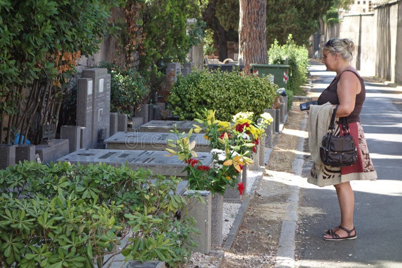 Woman at jewish cemetery stock images Woman at jewish cemetery stock images