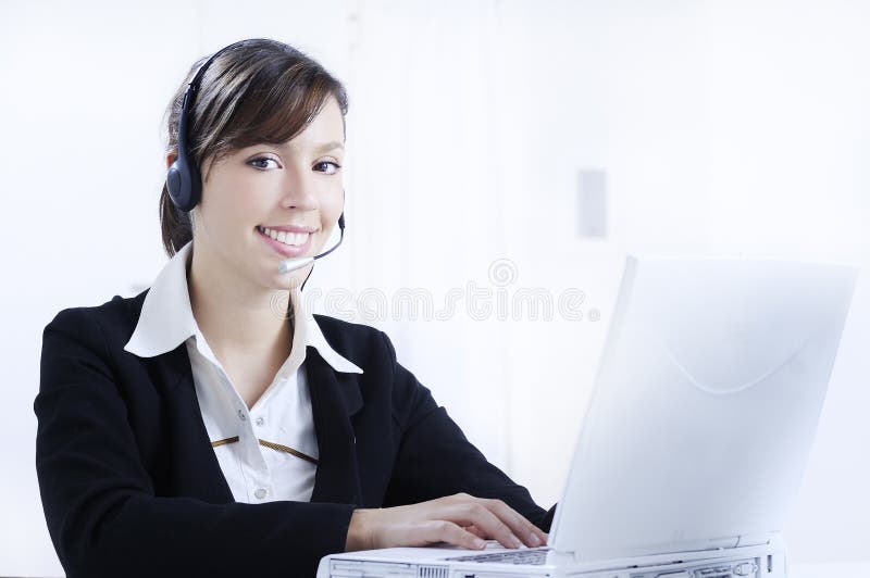 Woman in job; headphones and customer service