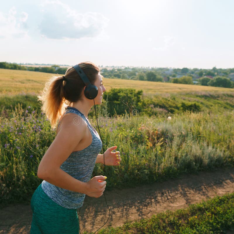 Woman Jogger Working Out In The Morning Sunny Day Stock Image Image