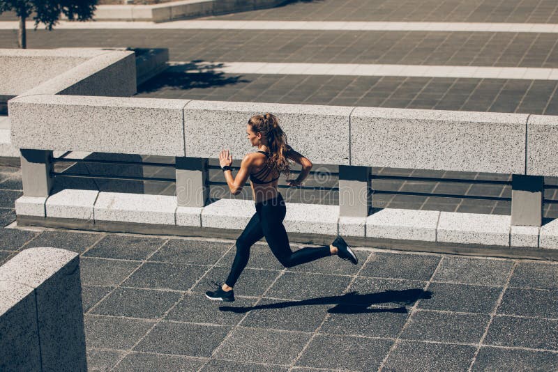 Woman Jogging Early in the Morning Stock Image - Image of jogger, slim ...