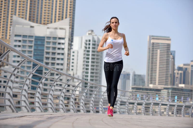 Woman jogging at morning stock photo. Image of girl, legs - 33008550