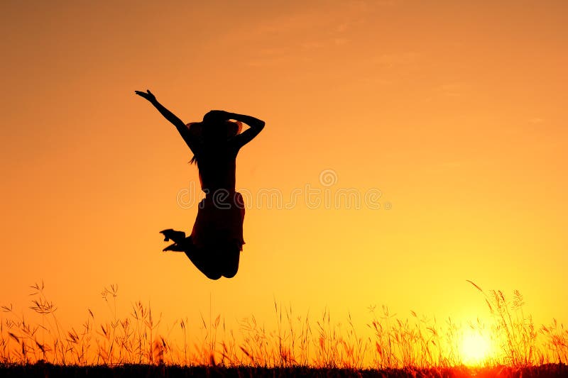 Happy Woman Jumping And Enjoying Life In Field At Sunset In Mountains Stock  Photo, Picture and Royalty Free Image. Image 97035120.