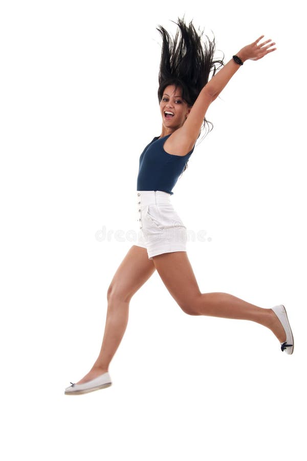 Woman jumping with arms up