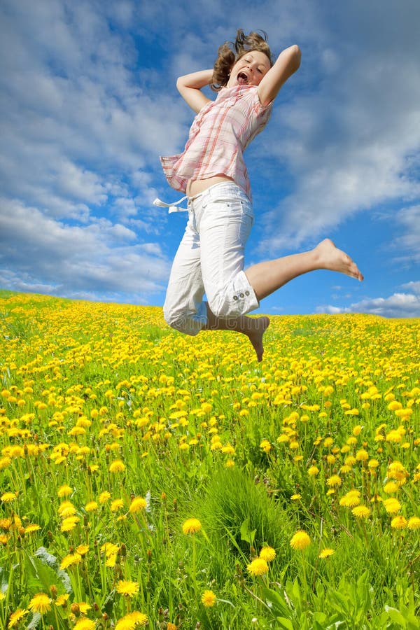 Woman jumping in field