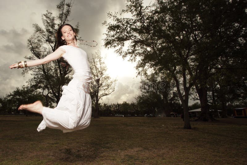 Woman jumping in the park