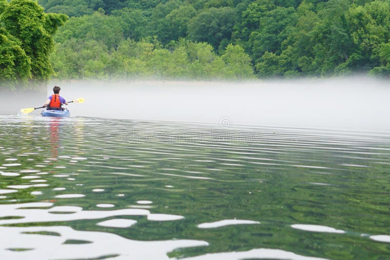 Woman in kayak stock photo Woman in kayak stock photo