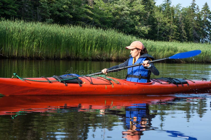 Woman Kayaking stock photo. Image of outdoor, nature 27420642