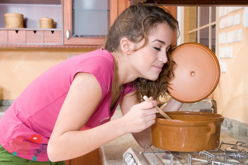 Woman in the kitchen cooking