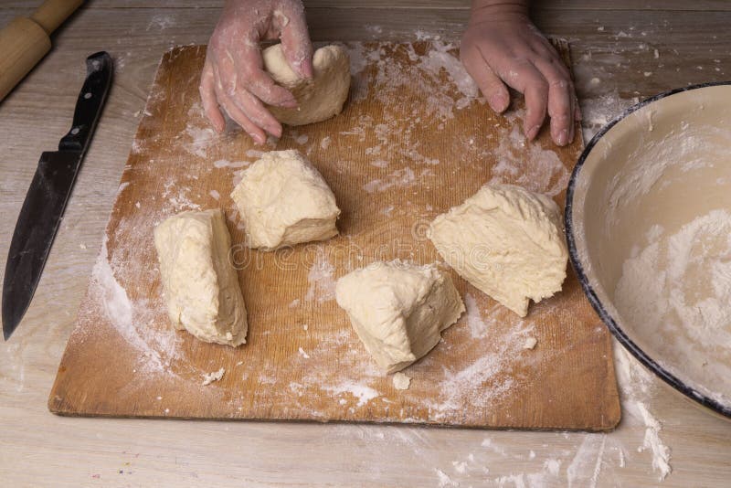 A Woman Kneads the Dough. Plywood Cutting Board, Wooden Flour Sieve and ...