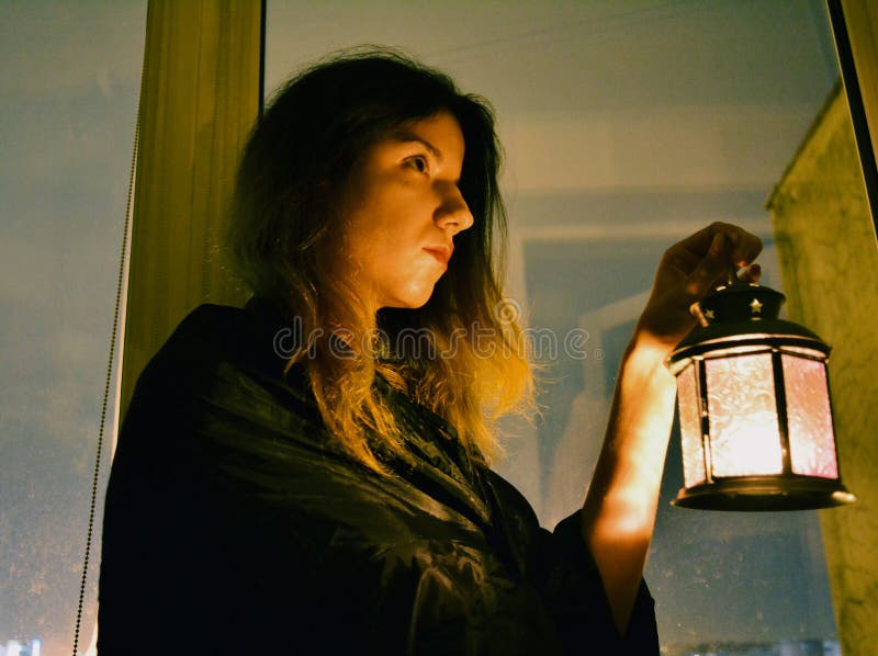 248 Woman Oil Lamp Night Stock Photos Free & RoyaltyFree Stock Photos from Dreamstime