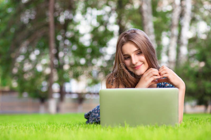 Woman with laptop at home happy showing love with hands in heart shape royalty free stock image Woman with laptop at home happy showing love with hands in heart shape royalty free stock image
