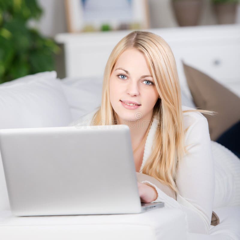 Woman with Laptop Lying on Sofa Stock Image - Image of blonde, relaxed ...