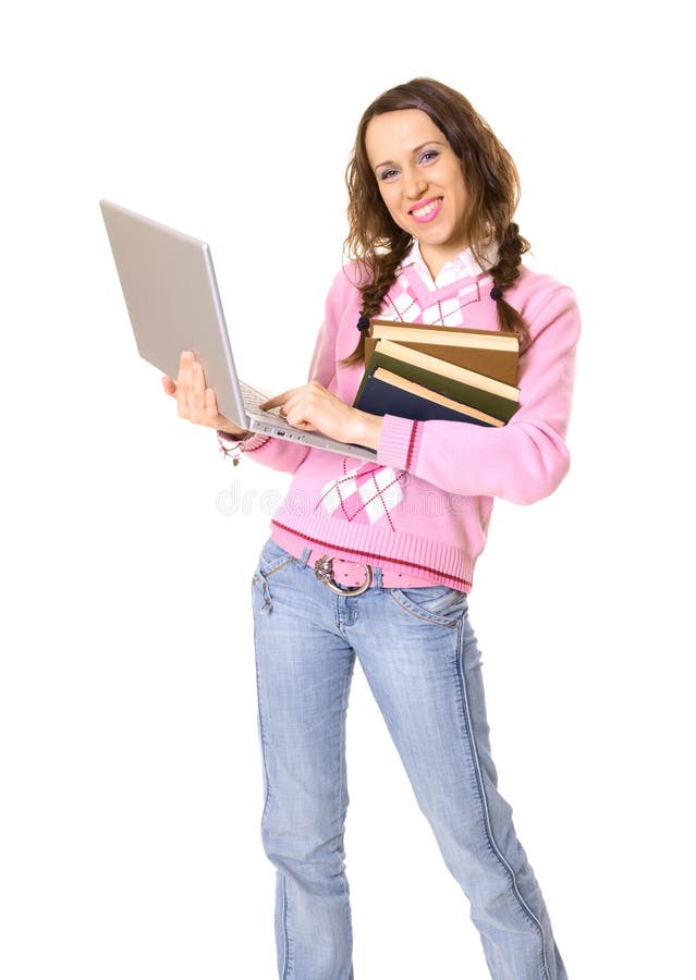 Woman with laptop and pile of books