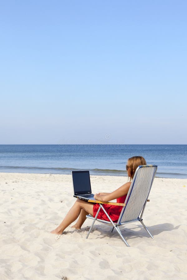 Woman with laptop stock image