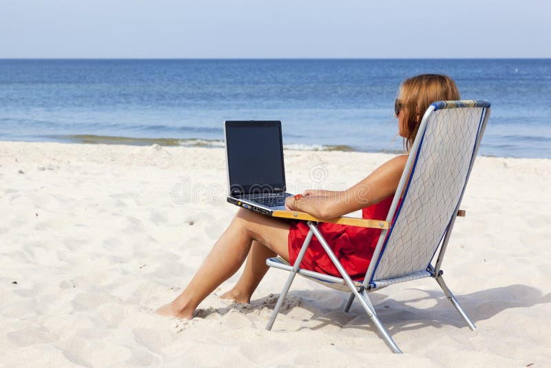 Woman with laptop stock photography