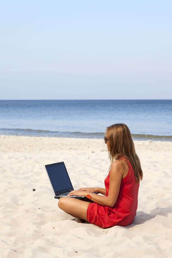 Woman with laptop stock image