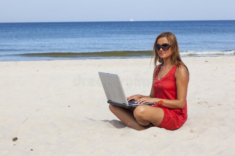 Woman with laptop stock photography