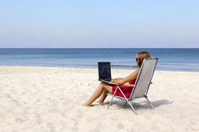 Woman with laptop stock photos