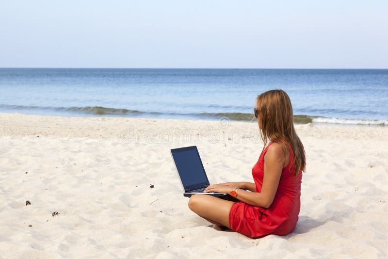 Woman with laptop stock photos