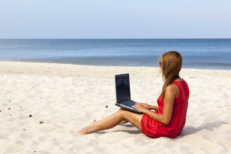 Woman with laptop stock image