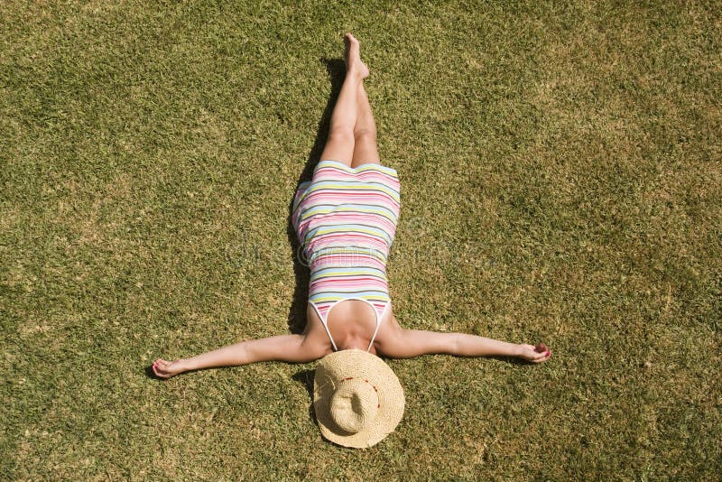 Woman laying in the grass