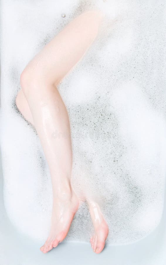 Woman Legs in Bath with Foam Stock Image - Image of foot, water: 5478949