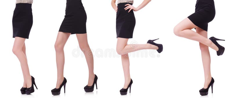 The woman legs isolated on the white stock image The woman legs isolated on the white stock image