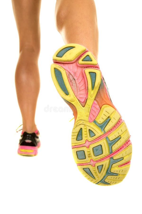 Woman legs very fit from back walk away bottom of shoe