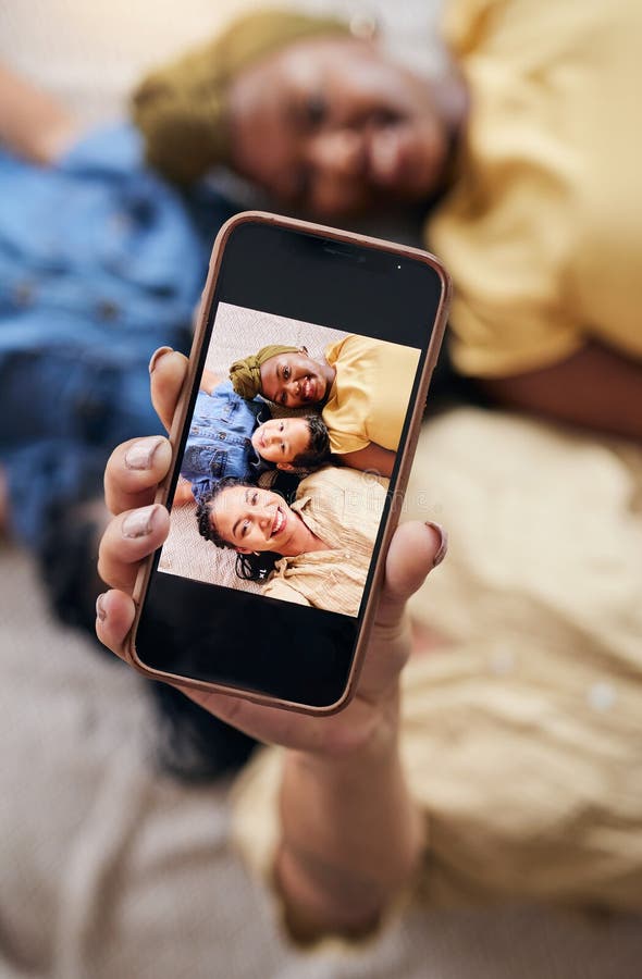 Woman, lesbian couple and child in selfie on floor for social media, photography or online post together at home royalty free stock photos