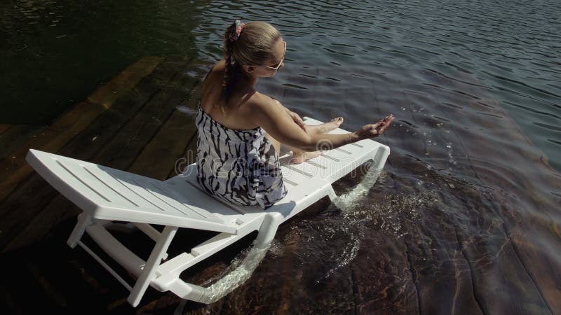 Woman Lie on a Sunbed in Sunglasses and a Boho Silk Shawl. Girl Rest on ...