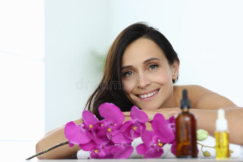 Woman Lies And Smiles In Massage Room Closeup Stock Image Image Of 