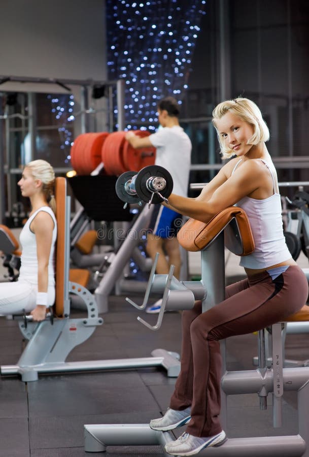 Woman Lifting Heavy Weights Stock Photo Image of dumbbell, exertion