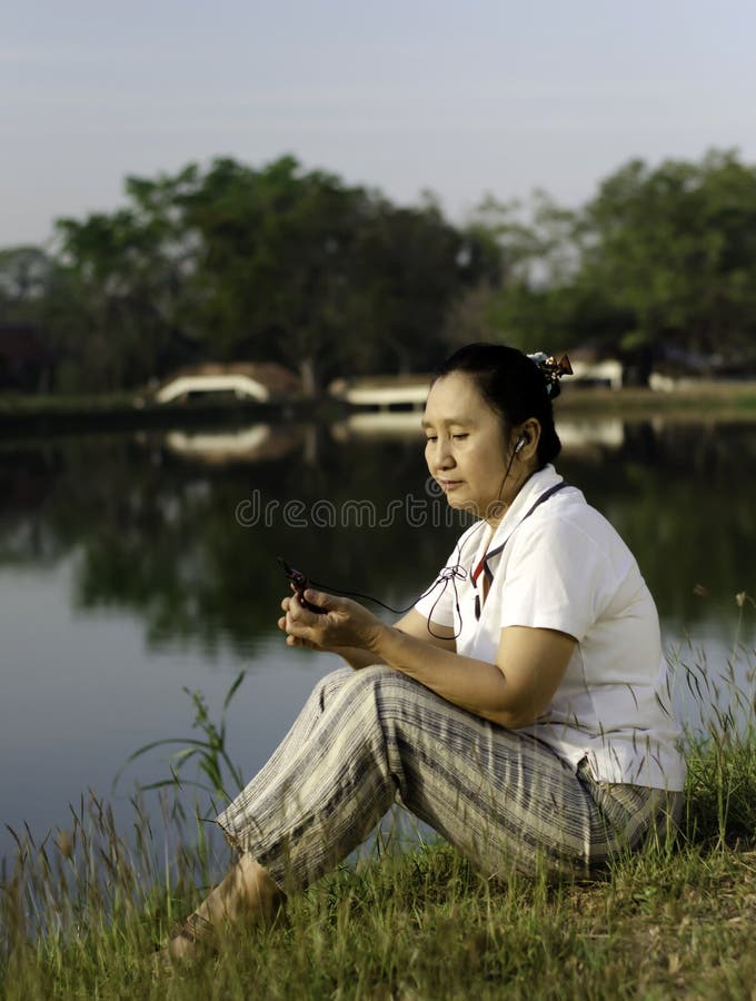 Woman Listening To MP3